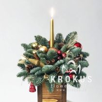 Ziemassvētku kompozīcija ar svecīti